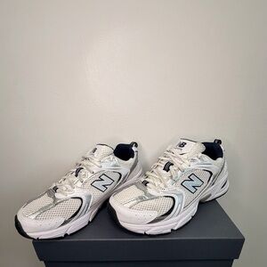 New Balance men's White and Black Sneakers